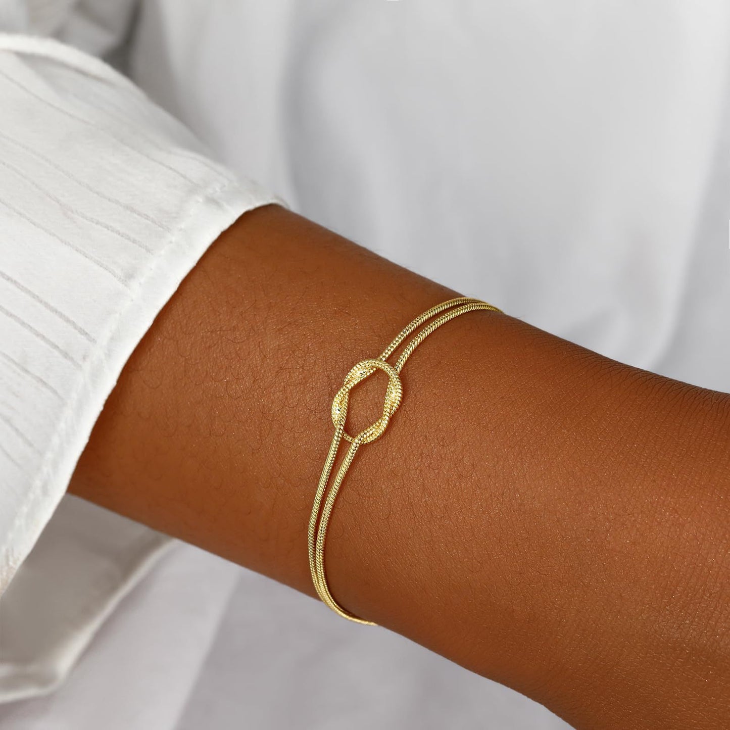 elegant tarnish resistant brass layered snake chain bracelet high polish infinitesimal love knot adjustable comfort fit smooth fluid bone link wristband premium romantic charm