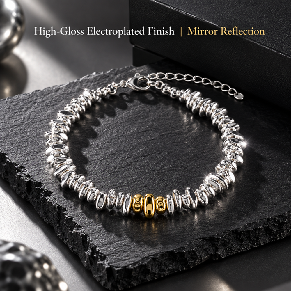 two-tone irregular nugget bead bracelet with gold-tone accents and adjustable extender