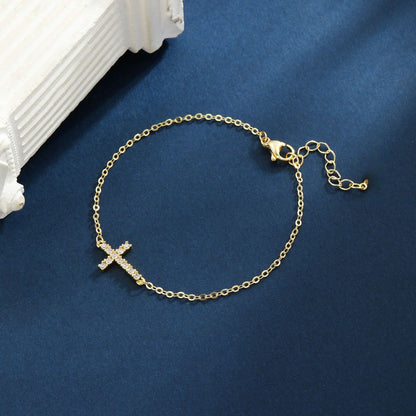 Gold-tone Cross Brass Bracelet for Women Dainty Sideways Cross Chain Bracelet Sparkly Cubic Zirconia Faith Charm Jewelry Gift Adjustable Lobster Clasp