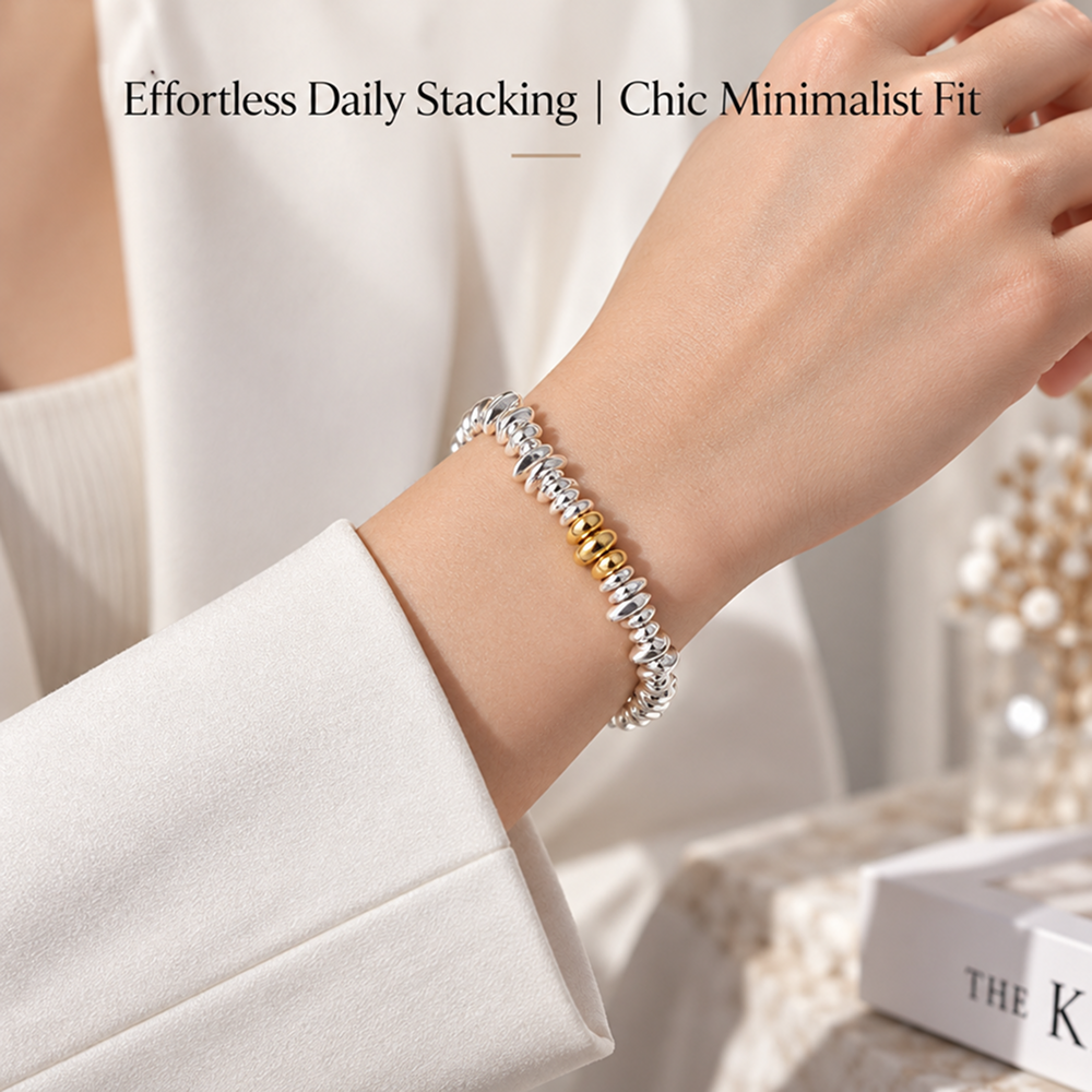 two-tone irregular nugget bead bracelet with gold-tone accents and adjustable extender