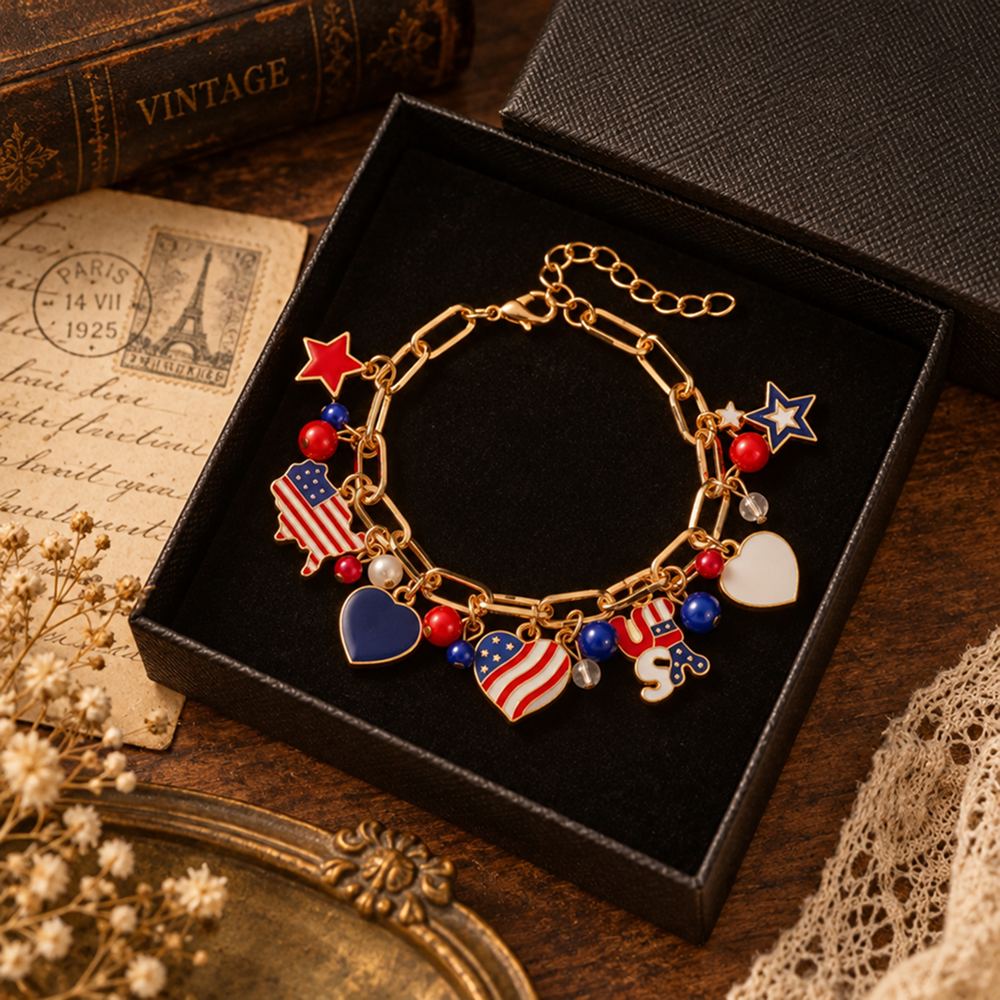 gold-tone usa patriotic charm bracelet with flag, heart and star designs and adjustable extender