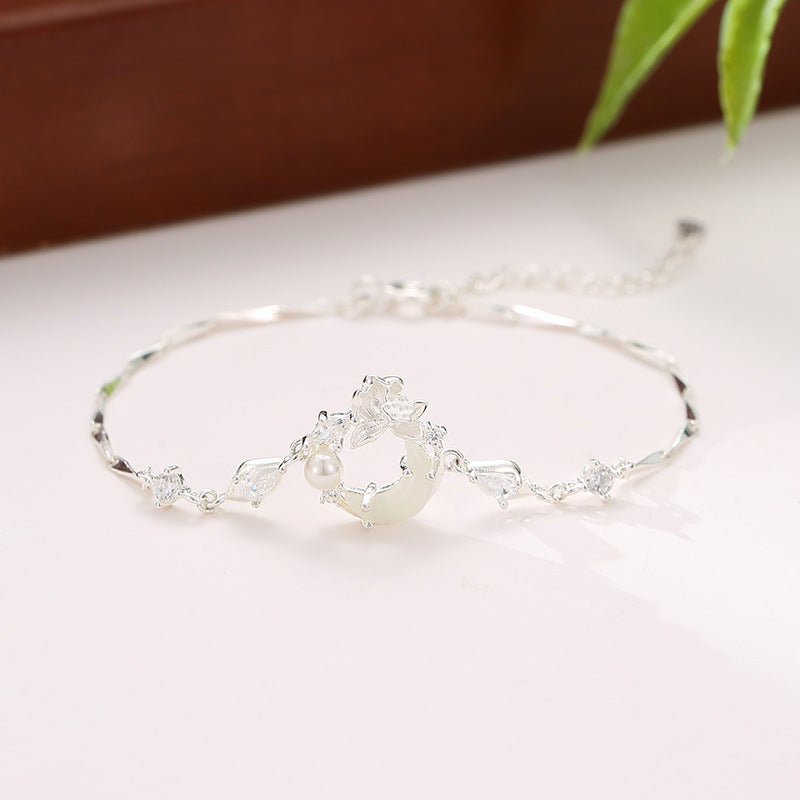 delicate jade bracelet featuring hetian jade, 925 silver, lotus, and moon motifs | star8s