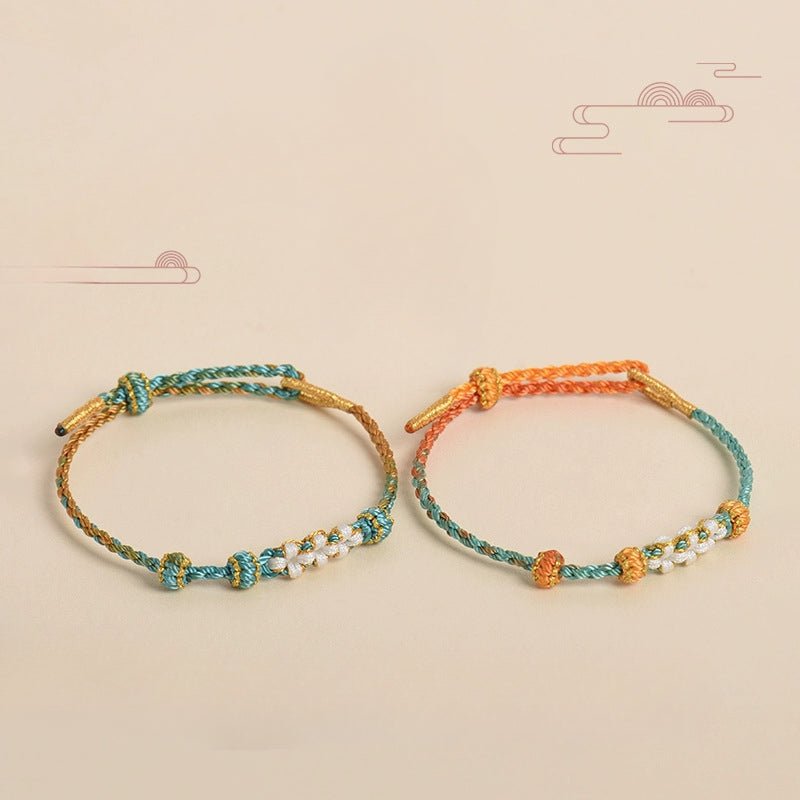 elegant handcrafted peach blossom knot bracelet – adjustable red cord & golden thread design | star8s