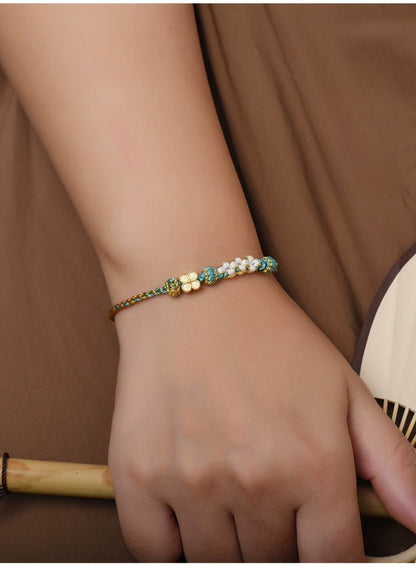 Elegant Handcrafted Peach Blossom Knot Bracelet – Adjustable Red Cord & Golden Thread Design | STAR8S