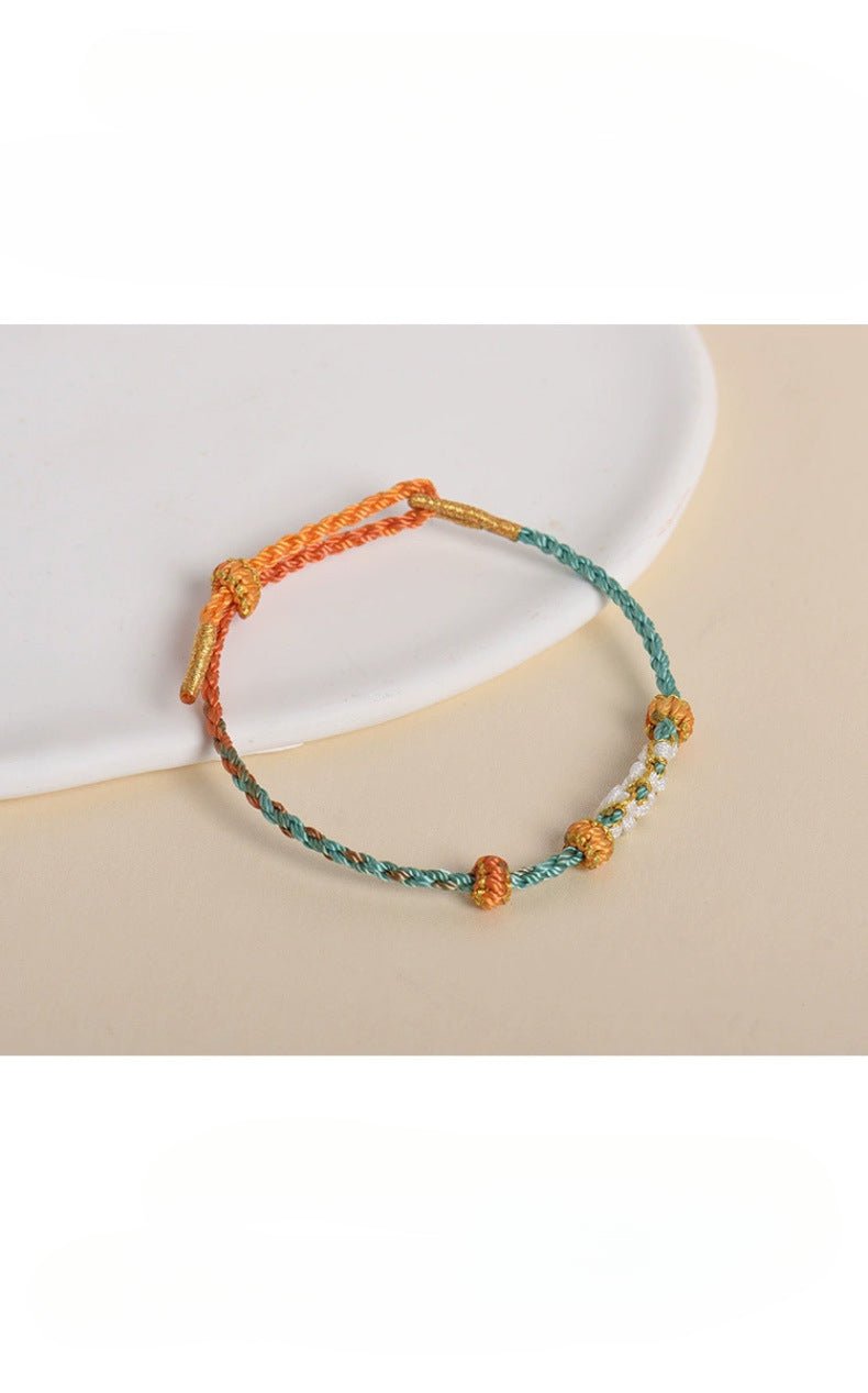 elegant handcrafted peach blossom knot bracelet – adjustable red cord & golden thread design | star8s