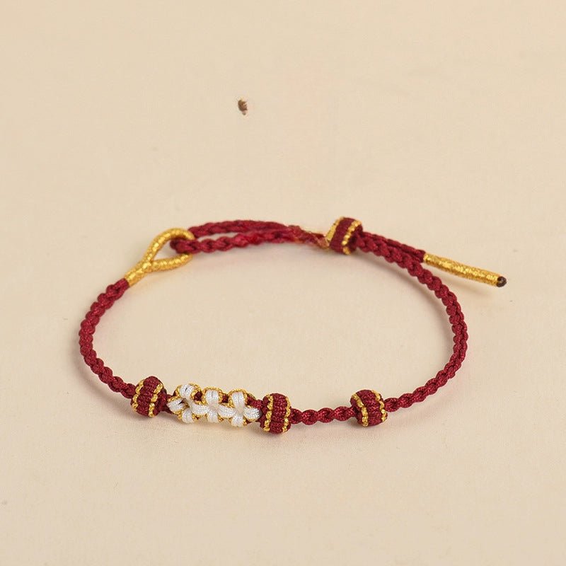 elegant handcrafted peach blossom knot bracelet – adjustable red cord & golden thread design | star8s