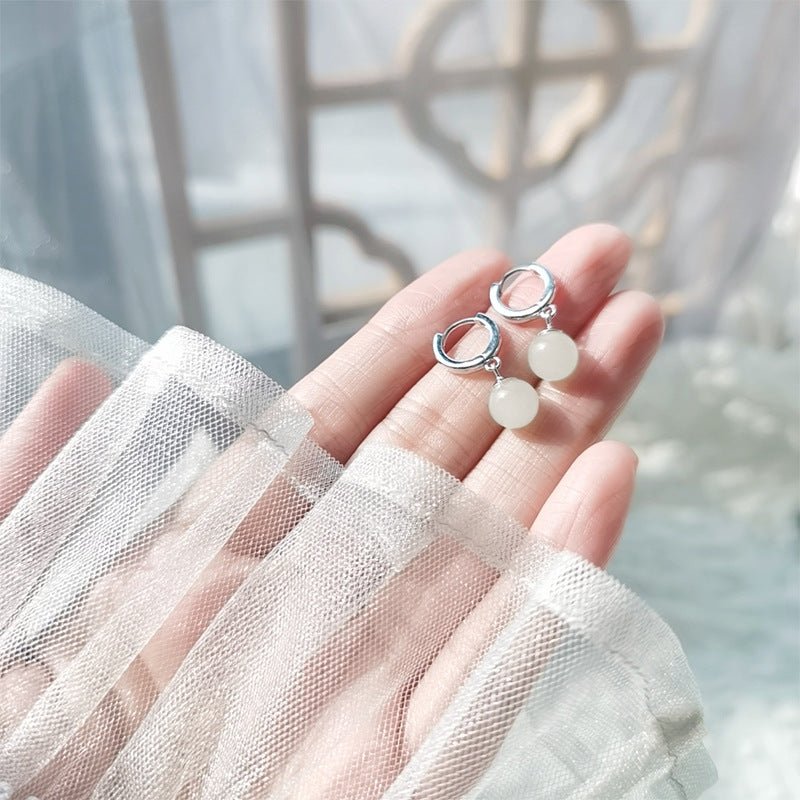 ethical hetian jade round earrings - traditional chinese craftsmanship - star8s