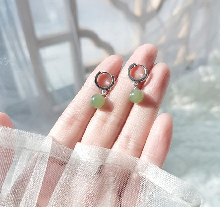 ethical hetian jade round earrings - traditional chinese craftsmanship - star8s