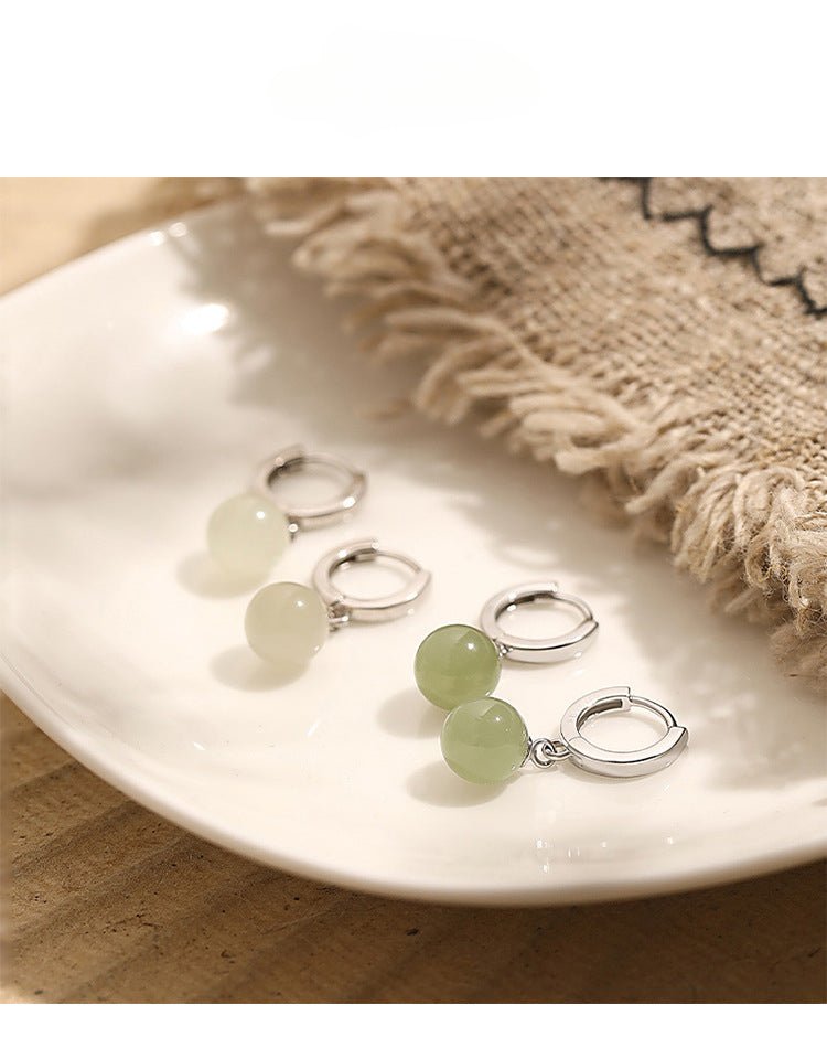 ethical hetian jade round earrings - traditional chinese craftsmanship - star8s