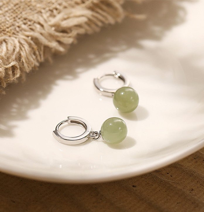 ethical hetian jade round earrings - traditional chinese craftsmanship - star8s