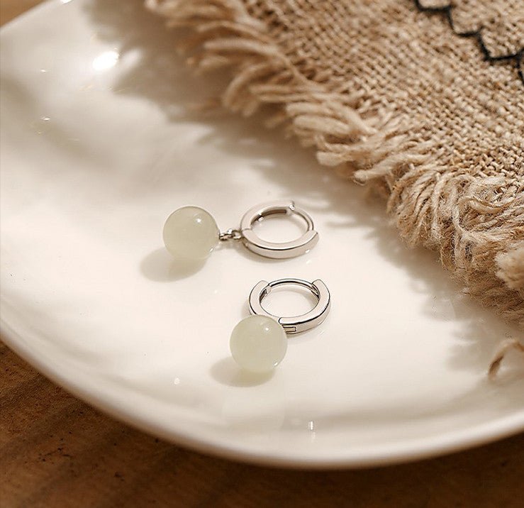 ethical hetian jade round earrings - traditional chinese craftsmanship - star8s