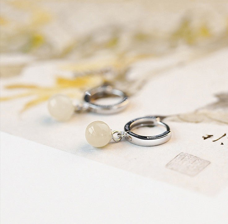 ethical hetian jade round earrings - traditional chinese craftsmanship - star8s