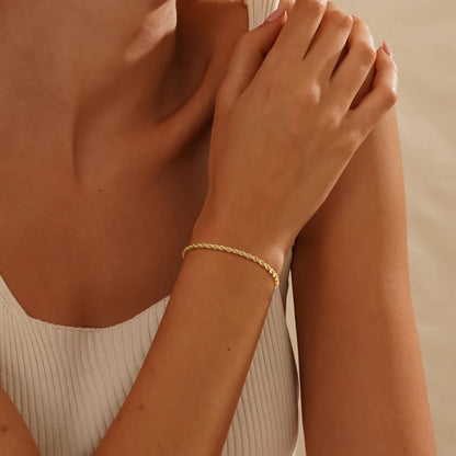 Twisted Rope Chain Bracelet for Women, Gold-Tone Electroplated Brass, 6.5 Inch Chain with 1.5 Inch Extender and Lobster Clasp, Slim 0.1 Inch Width, Minimalist Wrist Jewelry for Everyday Outfits, Layering, Workwear, Birthdays and Anniversary Gift Givi