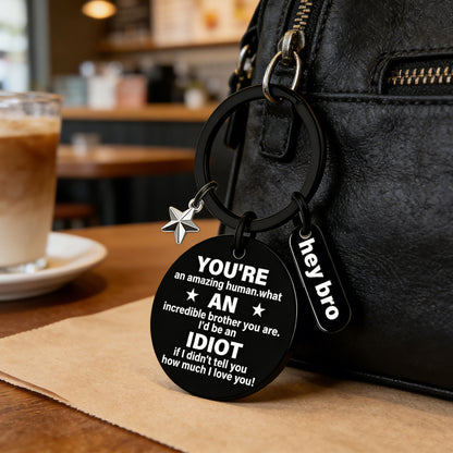 Funny Brother Keychain Gift from Sister Brother Stainless Steel Black Engraved Round Key Ring Charm Pendant with Star Hey Bro Sign Birthday Graduation Christmas Motivational Gag Gift for Men Teens 1.17" 13.5g
