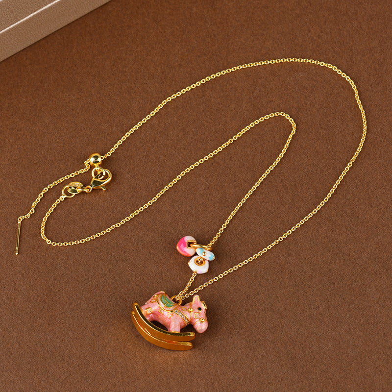 Chinese Zodiac Enamel Rocking Horse Necklace – Pink Macaron Style with High-Temperature Enamel and Gold Accents - STAR8S