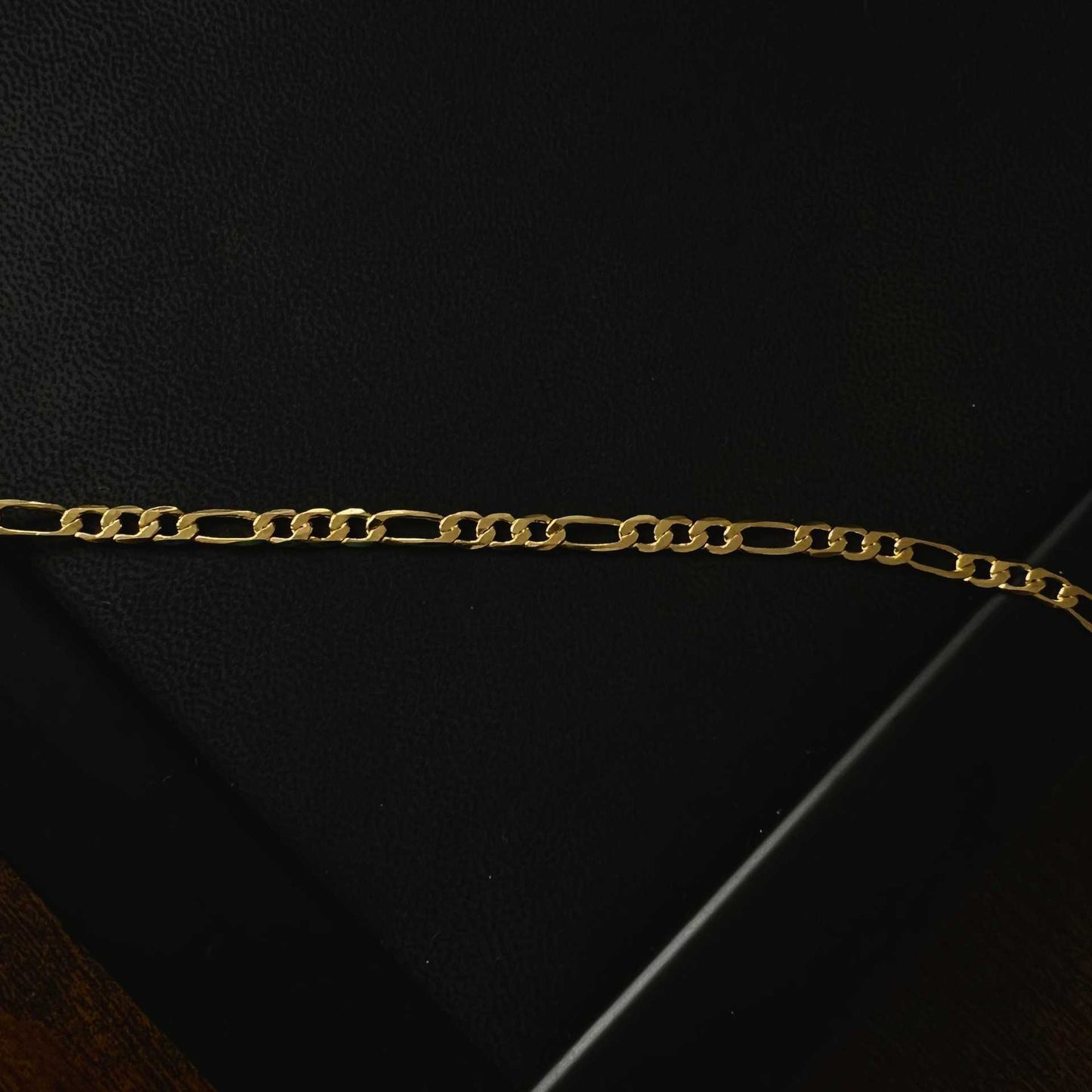 sleek tarnish resistant gold tone figaro link copper bracelet high polish classic italian style pattern adjustable comfort fit non-fading everyday waterproof hand ornament