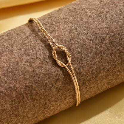 Elegant Tarnish Resistant Brass Layered Snake Chain Bracelet High Polish Infinitesimal Love Knot Adjustable Comfort Fit Smooth Fluid Bone Link Wristband Premium Romantic Charm