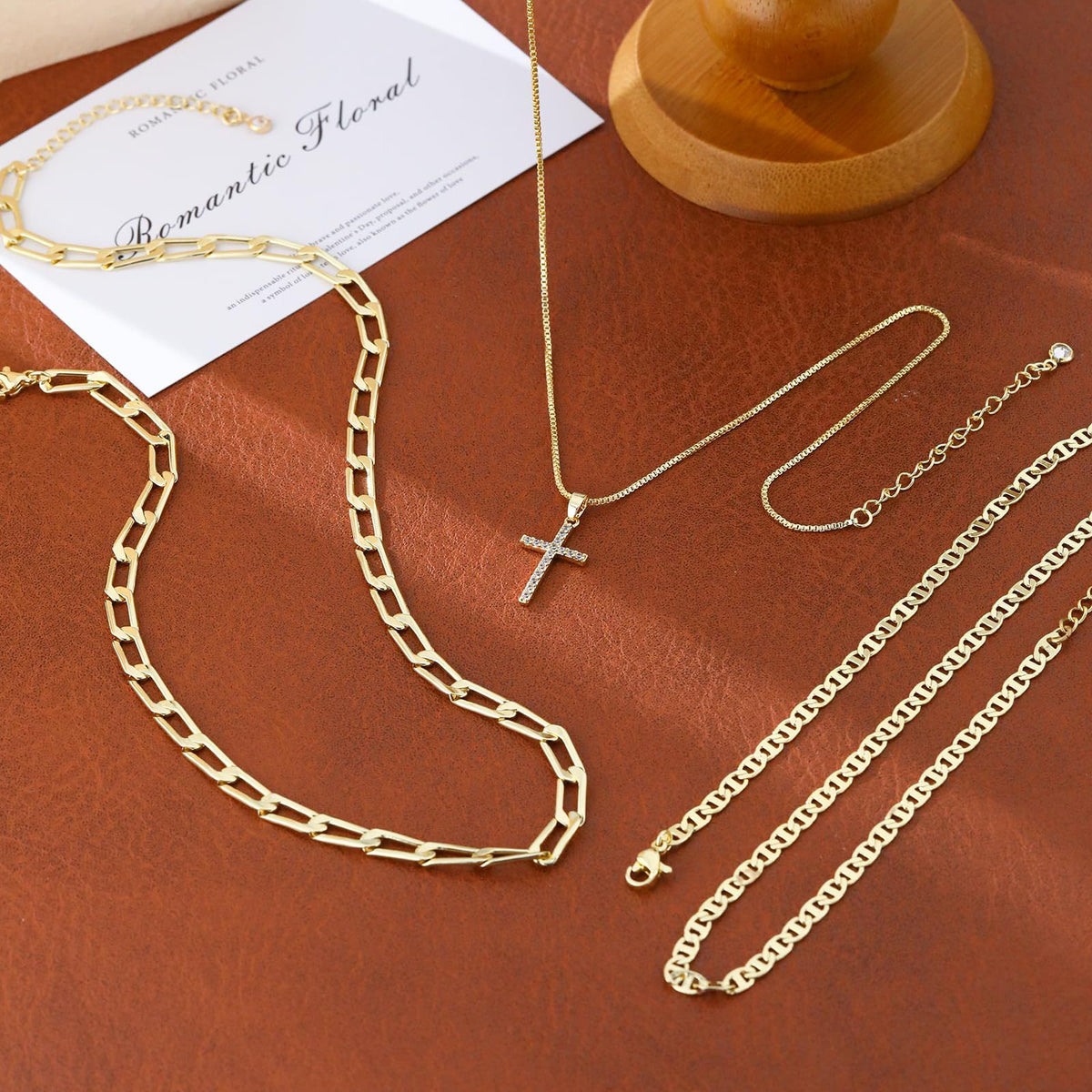 layered cross necklace set for women, 3 gold-tone electroplated brass chains with sparkling cross pendant, flat link and paperclip styles, 15, 16 and 18 inch lengths with 2 inch extenders, lobster clasps, everyday jewelry for blouses, dresses and swe