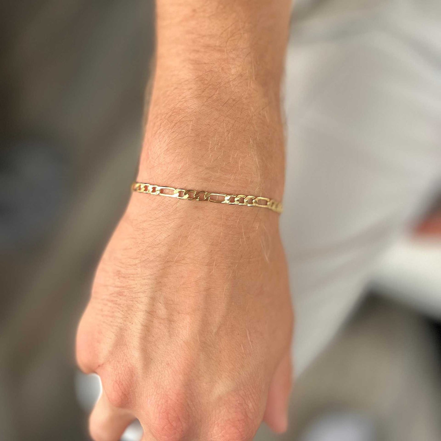 sleek tarnish resistant gold tone figaro link copper bracelet high polish classic italian style pattern adjustable comfort fit non-fading everyday waterproof hand ornament
