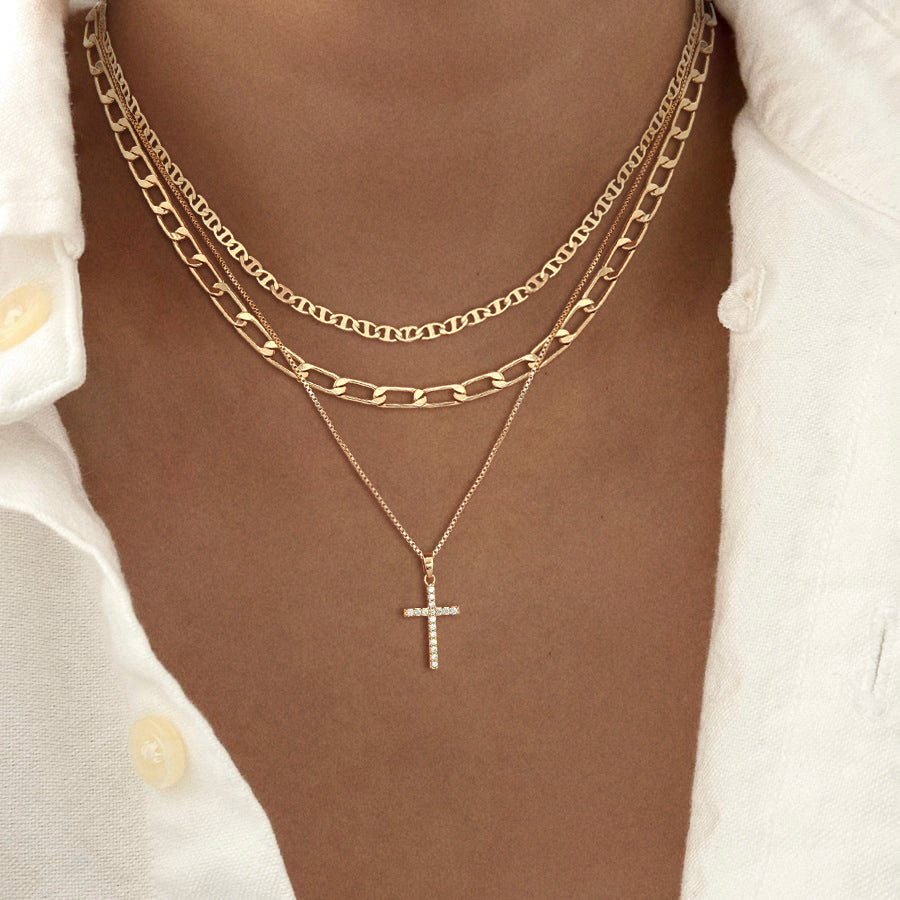 layered cross necklace set for women, 3 gold-tone electroplated brass chains with sparkling cross pendant, flat link and paperclip styles, 15, 16 and 18 inch lengths with 2 inch extenders, lobster clasps, everyday jewelry for blouses, dresses and swe