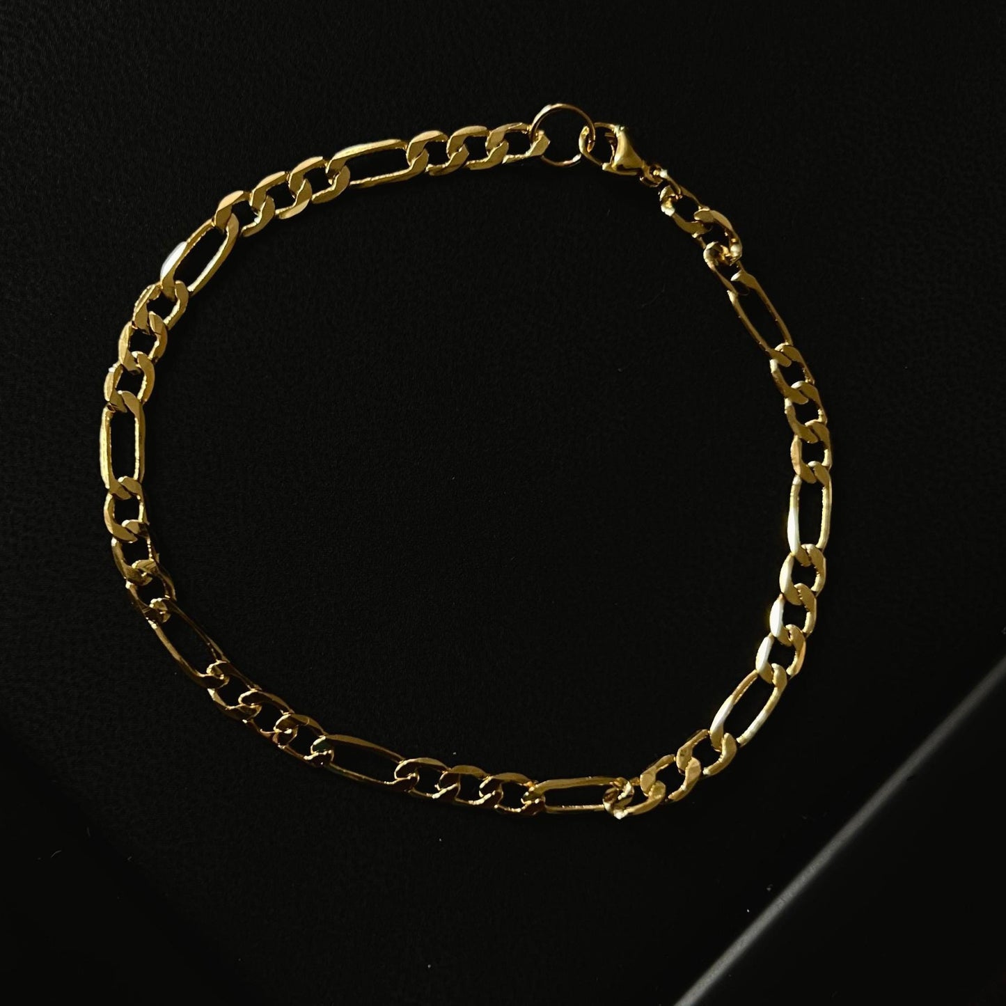 sleek tarnish resistant gold tone figaro link copper bracelet high polish classic italian style pattern adjustable comfort fit non-fading everyday waterproof hand ornament