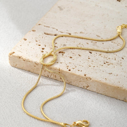 Elegant Tarnish Resistant Brass Layered Snake Chain Bracelet High Polish Infinitesimal Love Knot Adjustable Comfort Fit Smooth Fluid Bone Link Wristband Premium Romantic Charm