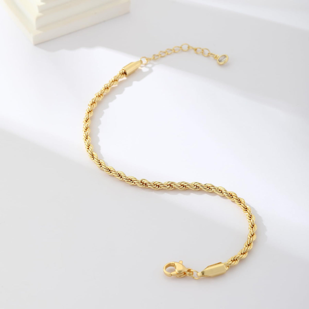 twisted rope chain bracelet for women, gold-tone electroplated brass, 6.5 inch chain with 1.5 inch extender and lobster clasp, slim 0.1 inch width, minimalist wrist jewelry for everyday outfits, layering, workwear, birthdays and anniversary gift givi