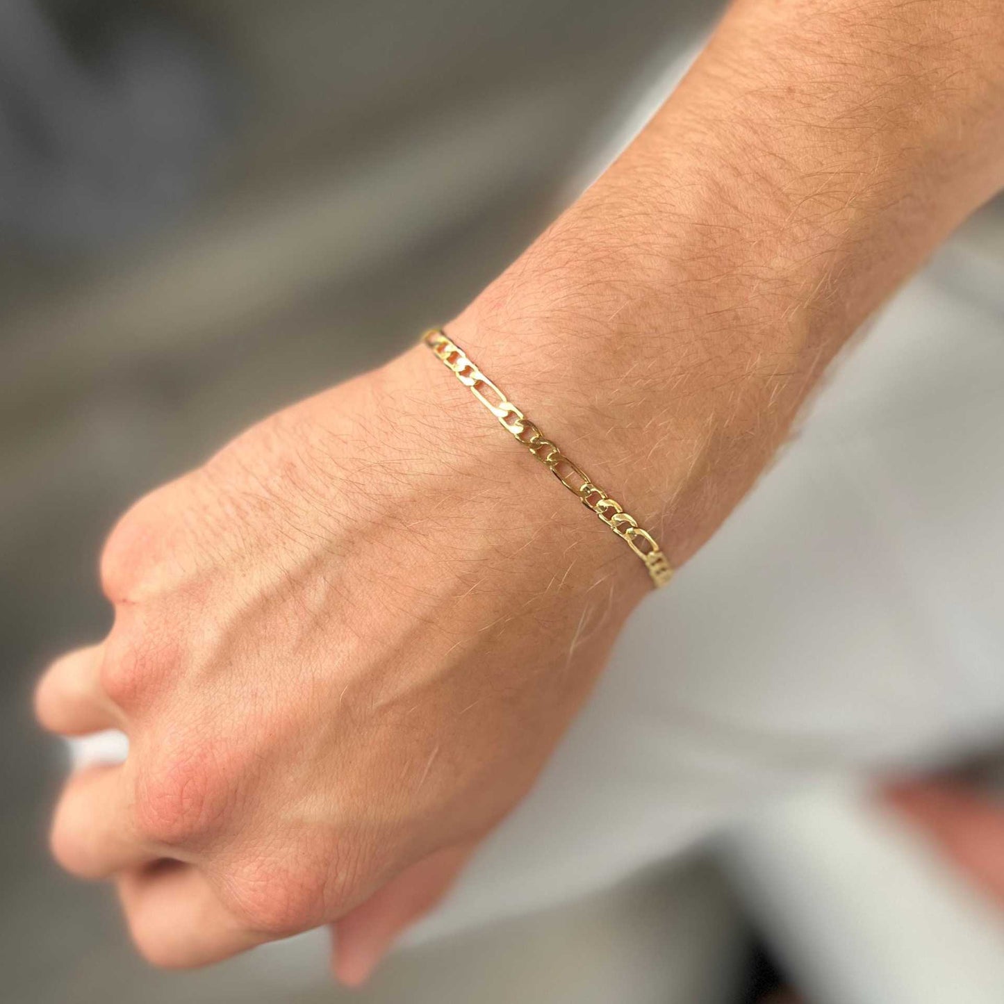sleek tarnish resistant gold tone figaro link copper bracelet high polish classic italian style pattern adjustable comfort fit non-fading everyday waterproof hand ornament