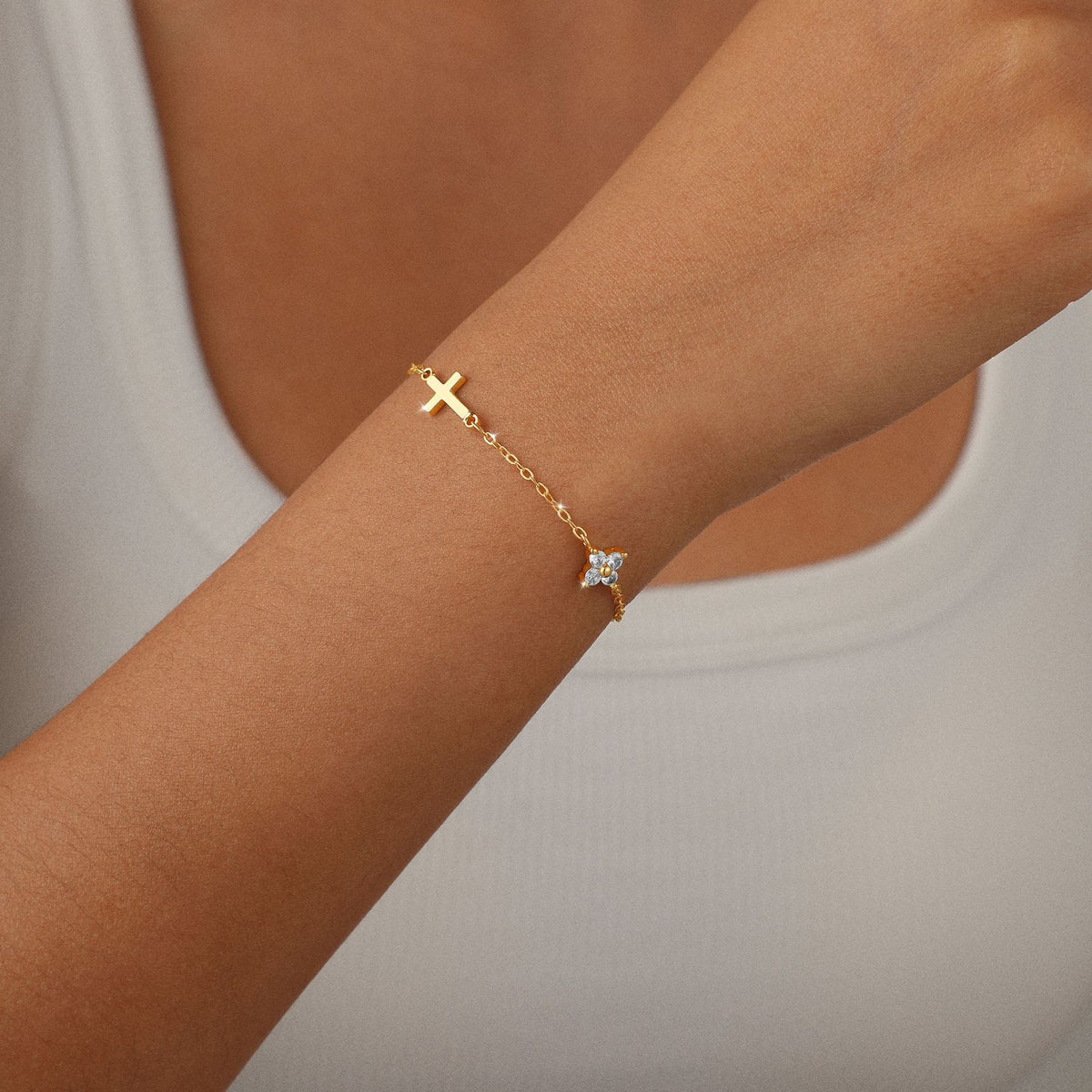 gold-tone cross and clover bracelet for women, electroplated brass adjustable chain with clear stone accents, dainty everyday jewelry