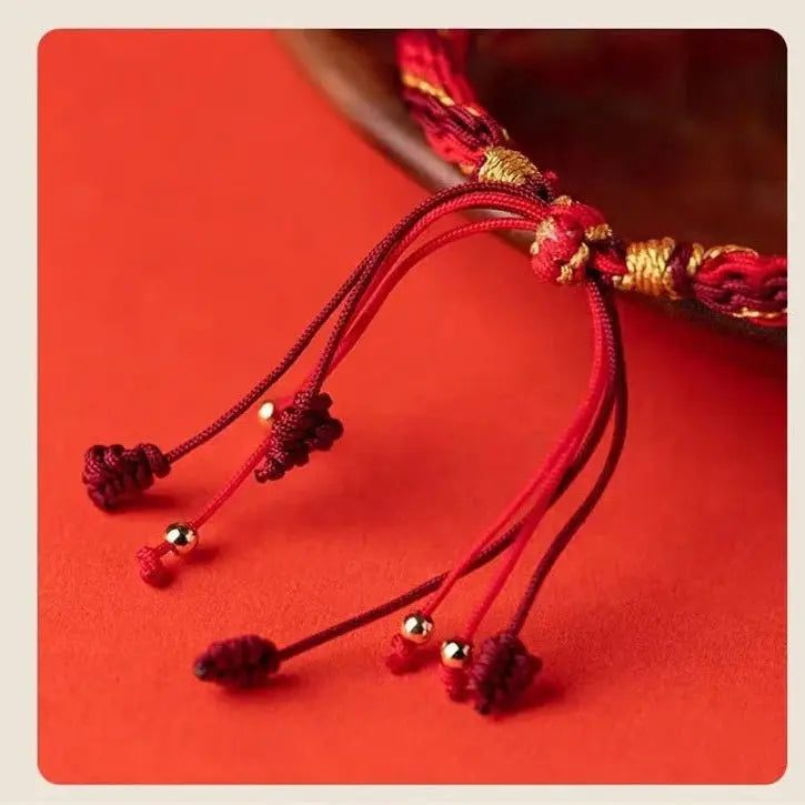 protective tibetan bracelet: god of wealth vajra knot red string | star8s - star8s