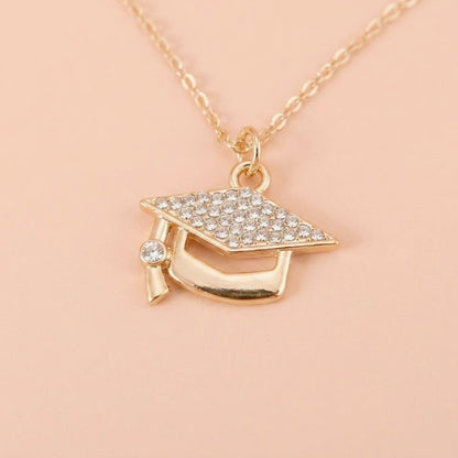 Trendy Rhinestone Graduation Cap Pendant Necklace for Women Girls Gold Plated Class of 2026 Doctoral Mortarboard Charm Choker Chain Memorial Jewelry Gift with Inspirational Card Going Places