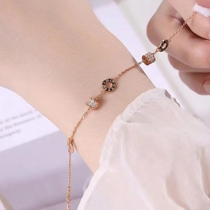 rose gold tone roman numeral bracelet for women, minimalist interlocking circles small waist charm bracelet, crystal pave cubic zirconia dainty chain link jewelry, birthday anniversary gift for girlfriend mother her