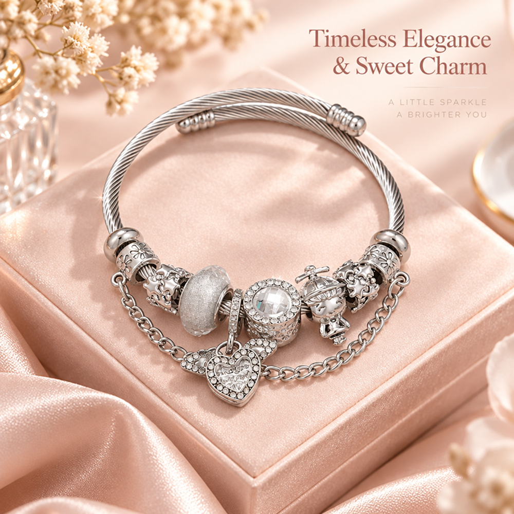 silver-tone charm bracelet with winged heart, decorative beads and cable texture