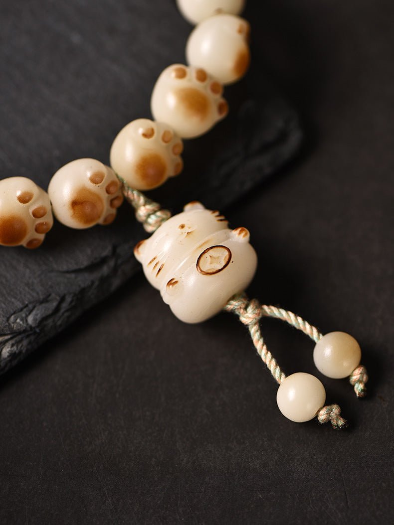 charcoal - burned cat paw bodhi root bracelet with white jade bodhi beads - star8s