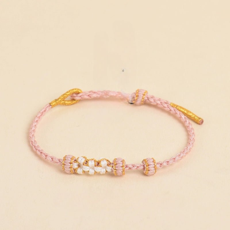 elegant handcrafted peach blossom knot bracelet – adjustable red cord & golden thread design | star8s
