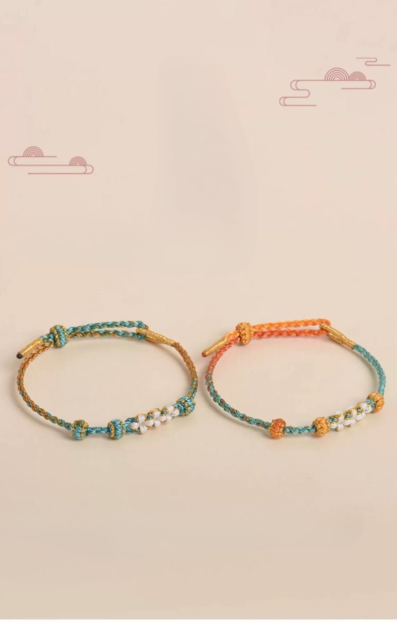 elegant handcrafted peach blossom knot bracelet – adjustable red cord & golden thread design | star8s