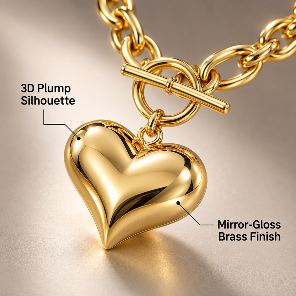 women's gold-plated brass puffed heart pendant necklace with chunky chain and toggle clasp