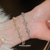 Zircon Iris Cross Adjustable Bracelet – Elegant & Luxurious Design